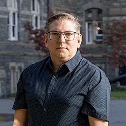 headshot of library employee Mike Matason